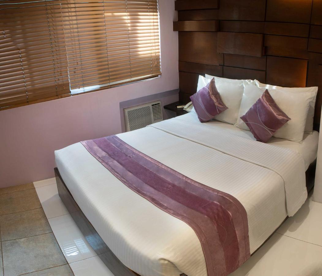 Acl Suites Кесон-Сити Экстерьер фото