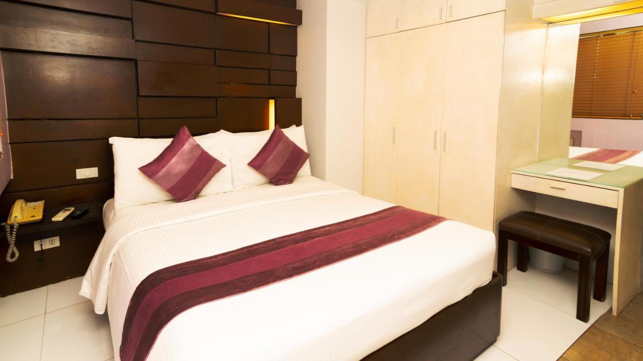 Acl Suites Кесон-Сити Экстерьер фото